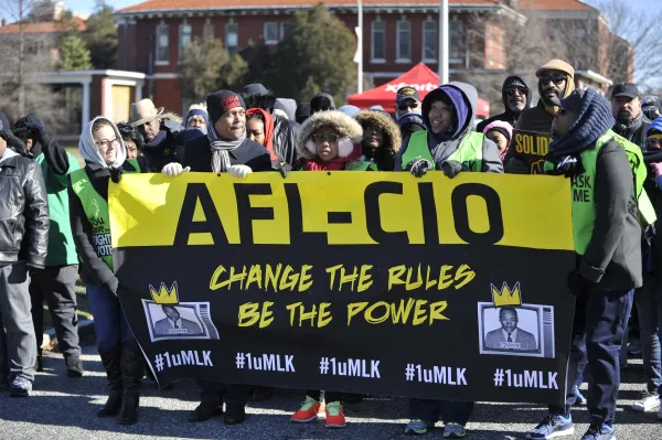 Marching with banner